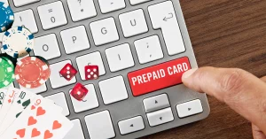 Casino Chips and Cards - Dice - Hand Clicking on an Enter Key Saying "Prepaid Card"